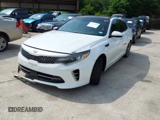 2016 Kia Optima SXL Turbo with VIN 5XXGV4L26GG015874, listed as a IAAI auction lot 42127366 with 166,970 mi miles. Bid and sale history available at carsss.com. Image 2.