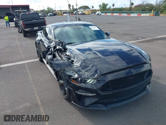 2021 Ford Mustang GT z VIN 1FA6P8CF1M5147740, wystawiony jako IAAI lot #38920487 z przebiegiem 15 299 mil mil oraz . Historia ofert i sprzedaży dostępna na DreamBid. Obrazek 19.