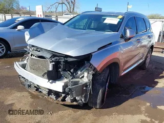 2021 Hyundai Santa Fe SEL z VIN 5NMS24AJ1MH356058, wystawiony jako IAAI lot #41800474 z przebiegiem 82 438 mil mil oraz . Historia ofert i sprzedaży dostępna na DreamBid. Obrazek 2.