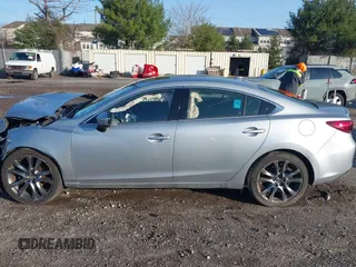 2017 Mazda 6 Grand Touring with VIN JM1GL1W50H1132261, listed as a IAAI auction lot 41930610 with 54,431 mi miles and . Bid and sale history available at DreamBid. Image 14.