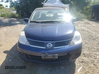 2007 Nissan Versa 1.8 SL with VIN 3N1BC11E27L432802, listed as a Copart auction lot 71018594 with 118,795 mi miles and Salvage Title. Bid and sale history available at carsss.com. Image 5.