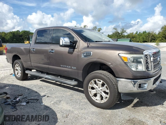 2016 Nissan Titan XD Platinum Reserve with VIN 1N6BA1F20GN500500, listed as a Copart auction lot 75396354 with 164,966 mi miles and Salvage Title. Bid and sale history available at carsss.com. Image 4.