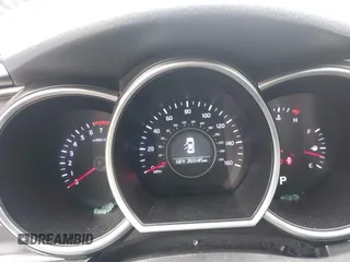 2015 Kia Optima LX z VIN KNAGM4A78F5588728, wystawiony jako IAAI lot #42116653 z przebiegiem 203 145 mil mil oraz . Historia ofert i sprzedaży dostępna na DreamBid. Obrazek 7.