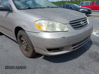 2003 Toyota Corolla CE with VIN 2T1BR32E03C102501, listed as a IAAI auction lot 42158080 with 62,688 mi miles and . Bid and sale history available at DreamBid. Image 6.