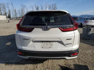 2020 Honda CR-V EX-L z VIN 7FART6H87LE012927, wystawiony jako Copart lot #49211085 z przebiegiem 79 188 mil mil oraz Szkoda całkowita • Salvage title. Historia ofert i sprzedaży dostępna na DreamBid. Obrazek 6.