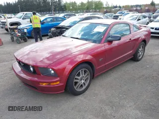 2005 Ford Mustang GT Deluxe with VIN 1ZVFT82HX55116087, listed as a IAAI auction lot 42039147 with 103,389 mi miles and . Bid and sale history available at DreamBid. Image 2.
