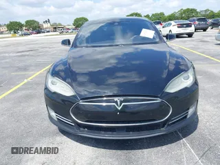 2015 Tesla Model S 85D with VIN 5YJSA1H21FFP79565, listed as a IAAI auction lot 42076401 with 162,139 mi miles. Bid and sale history available at carsss.com. Image 12.