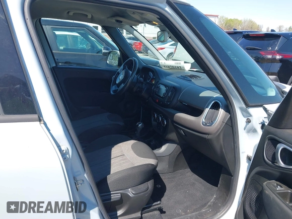 2015 FIAT 500L Easy with VIN ZFBCFABH8FZ031234, listed as a IAAI auction lot 41870102 with 86,267 mi miles and . Bid and sale history available at DreamBid. Image 5.