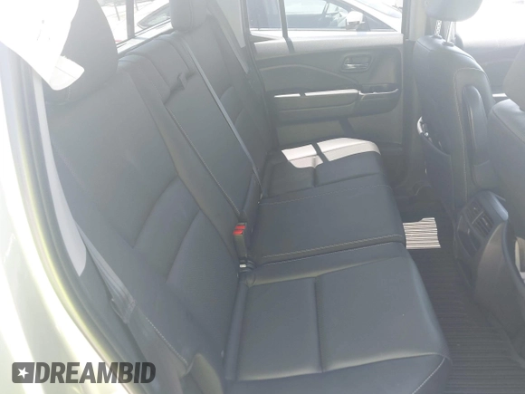 2020 Honda Ridgeline RTL with VIN 5FPYK3F5XLB019296, listed as a IAAI auction lot 42204290 with 48,197 mi miles and . Bid and sale history available at DreamBid. Image 8.