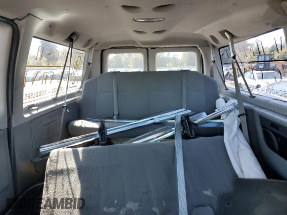 2011 Ford Econoline Passenger XL with VIN 1FBNE3BL4BDA89846, listed as a Copart auction lot 66189414 with 99,684 mi miles and Salvage Title. Bid and sale history available at carsss.com. Image 10.