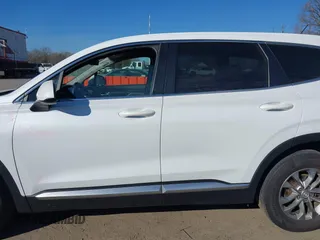 2019 Hyundai Santa Fe SE with VIN 5NMS2CAD5KH011357, listed as a IAAI auction lot 40918980 with 98,851 mi miles. Bid and sale history available at carsss.com. Image 14.