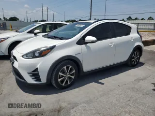 2018 Toyota Prius One z VIN JTDKDTB37J1615467, wystawiony jako Copart lot #52741245 z przebiegiem 63 666 mil mil oraz Czysty tytuł • Clean title. Historia ofert i sprzedaży dostępna na DreamBid. Obrazek 1.