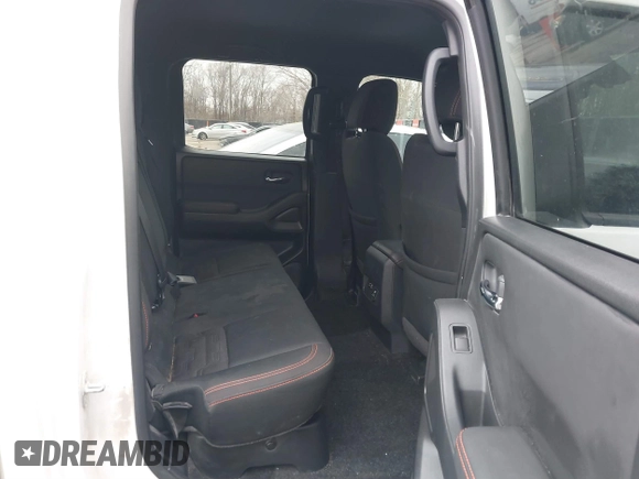2022 Nissan Frontier SV z VIN 1N6ED1EJ2NN646035, wystawiony jako IAAI lot #41702459 z przebiegiem 93 030 mil mil oraz . Historia ofert i sprzedaży dostępna na DreamBid. Obrazek 8.