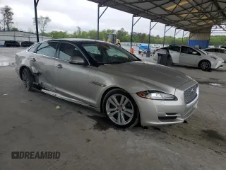 2016 Jaguar XJ Portfolio with VIN SAJWA2G70G8V93006, listed as a Copart auction lot 52324635 with 123,690 mi miles and Salvage Title. Bid and sale history available at DreamBid. Image 4.