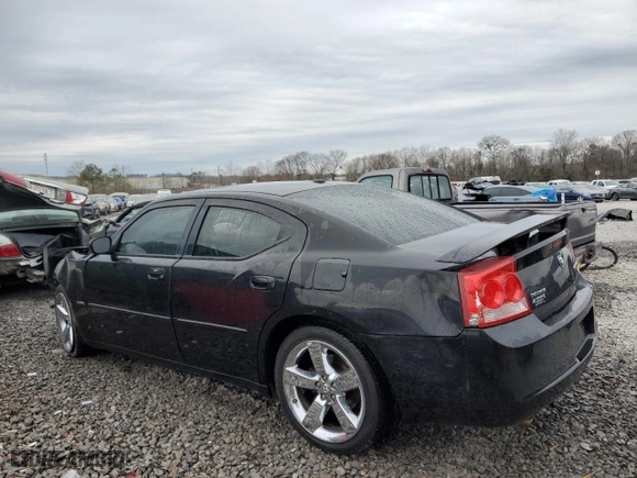 2010 Dodge Charger R/T with VIN 2B3CA5CT3AH172325, listed as a Copart auction lot 43948415 with 257,870 mi miles and Salvage Title. Bid and sale history available at carsss.com. Image 2.