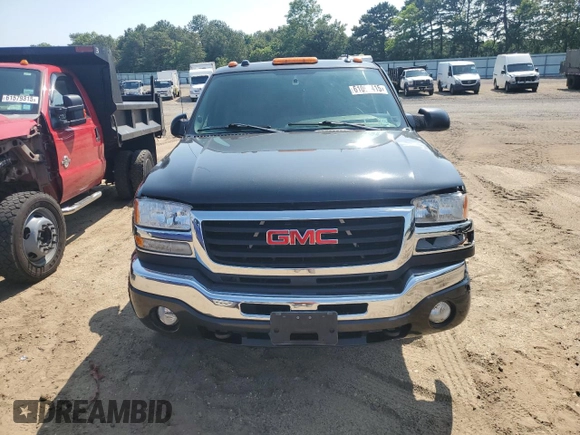 2005 GMC Sierra 2500HD SLT with VIN 1GTHK292X5E141116, listed as a Copart auction lot 61093415 with 160,630 mi miles and Salvage title. Bid and sale history available at DreamBid. Image 5.