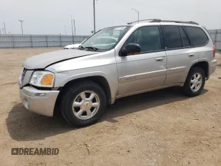 2004 GMC Envoy SLT with VIN 1GKDT13S842439635, listed as a Copart auction lot 63317194 with 201,672 mi miles and Salvage Title. Bid and sale history available at carsss.com. Image 1.