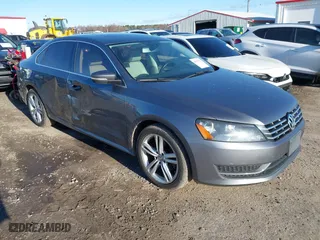 2015 Volkswagen Passat 2.0L TDI SE w/Sunroof with VIN 1VWBV7A39FC051559, listed as a IAAI auction lot 41723733 with 97,291 mi miles. Bid and sale history available at carsss.com. Image 1.