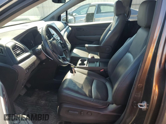 2018 Honda Odyssey EX-L with VIN 5FNRL6H78JB069850, listed as a Copart auction lot 49771875 with 103,914 mi miles and Salvage Title. Bid and sale history available at DreamBid. Image 7.