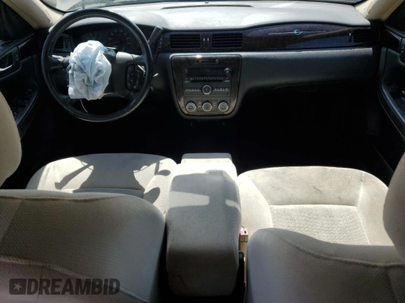 2012 Chevrolet Impala LS Retail with VIN 2G1WA5E39C1207446, listed as a Copart auction lot 56841685 with 89,128 mi miles and Salvage title. Bid and sale history available at DreamBid. Image 8.