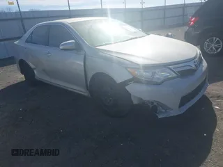 2012 Toyota Camry L with VIN 4T1BF1FK8CU124077, listed as a IAAI auction lot 41858808 with 123,444 mi miles. Bid and sale history available at carsss.com. Image 1.