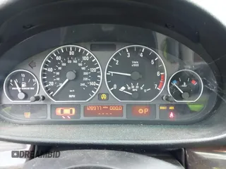 2001 BMW 3 Series 330i with VIN WBAAV53491JS94217, listed as a IAAI auction lot 42039234 with 128,977 mi miles. Bid and sale history available at carsss.com. Image 7.