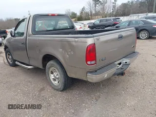 2002 Ford F-150 XL with VIN 3FTRF17212MA23970, listed as a IAAI auction lot 40991449 with 216,487 mi miles. Bid and sale history available at carsss.com. Image 3.