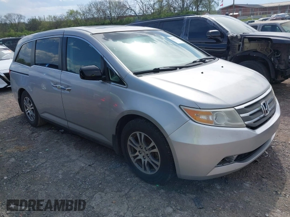 2012 Honda Odyssey EX-L with VIN 5FNRL5H68CB131431, listed as a IAAI auction lot 42012749 with 245,649 mi miles and . Bid and sale history available at carsss.com. Image 1.