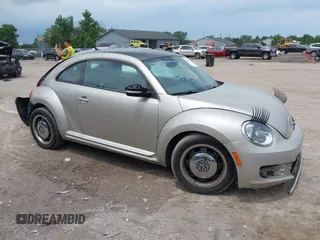 2012 Volkswagen Beetle 2.5L with VIN 3VWJX7AT9CM664345, listed as a IAAI auction lot 42496901 with 153,269 mi miles and . Bid and sale history available at DreamBid. Image 1.