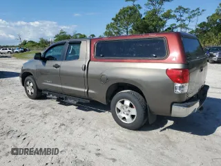 2010 Toyota Tundra 4WD Truck with VIN 5TFUM5F13AX014616, listed as a Copart auction lot 50953075 with 204,002 mi miles and Clean Title. Bid and sale history available at carsss.com. Image 2.