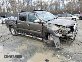 2015 Toyota Tacoma with VIN 3TMLU4EN4FM195426, listed as a Copart auction lot 86599744 with 136,461 mi miles and Salvage Title. Bid and sale history available at carsss.com. Image 4.