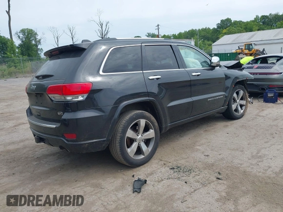 2015 Jeep Grand Cherokee Overland z VIN 1C4RJFCG3FC753772, wystawiony jako IAAI lot #42357411 z przebiegiem 130 970 mil mil oraz . Historia ofert i sprzedaży dostępna na DreamBid. Obrazek 4.