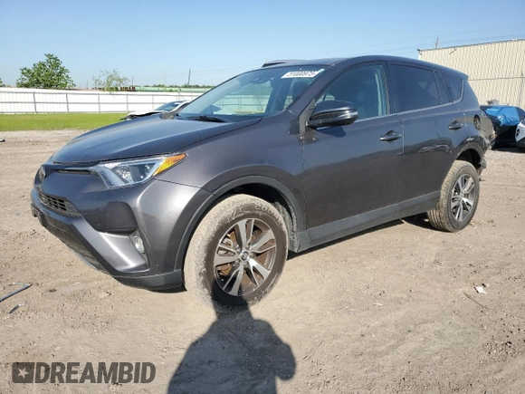2018 Toyota RAV4 XLE with VIN 2T3WFREV0JW517488, listed as a Copart auction lot 51000975 with 68,105 mi miles and Salvage title. Bid and sale history available at DreamBid. Image 1.