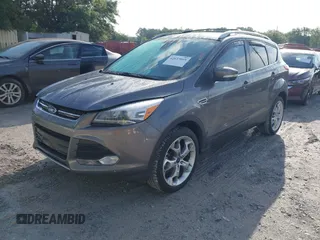 2013 Ford Escape Titanium with VIN 1FMCU0J96DUC31879, listed as a IAAI auction lot 42637019 with 66,096 mi miles and . Bid and sale history available at DreamBid. Image 2.