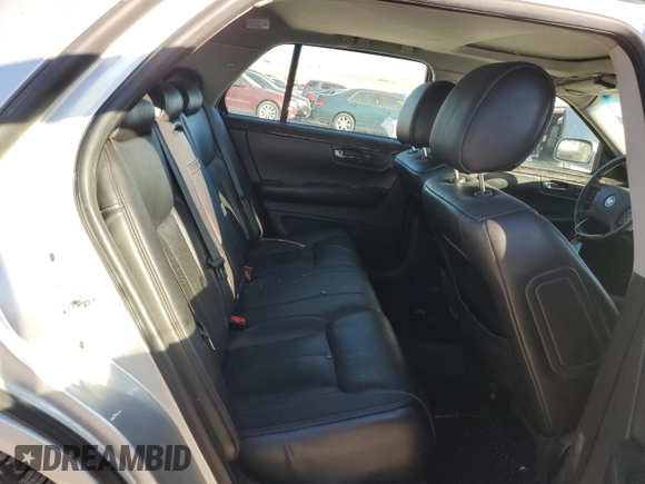 2009 Cadillac DTS 1SC z VIN 1G6KD57Y89U105190, wystawiony jako Copart lot #77560874 z przebiegiem 166 134 mil mil oraz Szkoda całkowita • Salvage title. Historia ofert i sprzedaży dostępna na DreamBid. Obrazek 10.