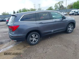 2016 Honda Pilot EX-L with VIN 5FNYF6H51GB097337, listed as a IAAI auction lot 42173415 with 145,415 mi miles. Bid and sale history available at carsss.com. Image 4.