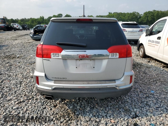 2017 GMC Terrain SLE z VIN 2GKALNEK3H6204575, wystawiony jako Copart lot #58817035 z przebiegiem 81 110 mil mil oraz Czysty tytuł • Clean title. Historia ofert i sprzedaży dostępna na DreamBid. Obrazek 6.