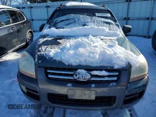 2005 Kia Sportage LX with VIN KNDJE723957107441, listed as a Copart auction lot 41530635 with 146,045 mi miles and Salvage Title. Bid and sale history available at carsss.com. Image 5.
