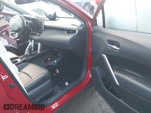 2023 Toyota Corolla Cross XLE with VIN 7MUDAABG0PV075695, listed as a IAAI auction lot 41170086 with 5,789 mi miles and . Bid and sale history available at DreamBid. Image 5.