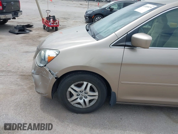 2005 Honda Odyssey EX with VIN 5FNRL38475B029026, listed as a IAAI auction lot 42489079 with 156,075 mi miles and . Bid and sale history available at DreamBid. Image 13.