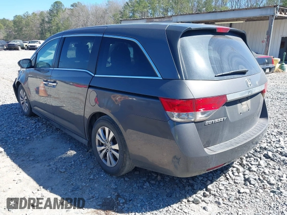2014 Honda Odyssey EX-L with VIN 5FNRL5H61EB014695, listed as a IAAI auction lot 41694860 with 261,265 mi miles and . Bid and sale history available at DreamBid. Image 3.
