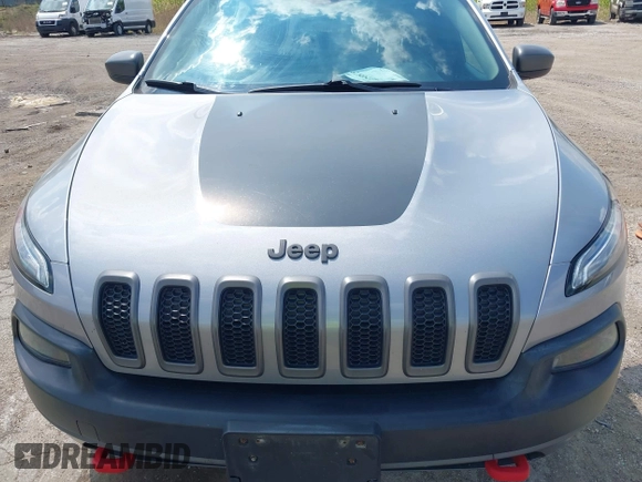 2015 Jeep Cherokee Trailhawk z VIN 1C4PJMBS5FW615313, wystawiony jako IAAI lot #42250873 z przebiegiem 148 008 mil mil oraz . Historia ofert i sprzedaży dostępna na DreamBid. Obrazek 6.