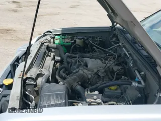 2003 Nissan Frontier XE z VIN 1N6ED27Y33C456883, wystawiony jako IAAI lot #42365584 z przebiegiem 235 954 mil mil oraz . Historia ofert i sprzedaży dostępna na DreamBid. Obrazek 13.