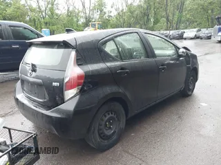 2015 Toyota Prius One z VIN JTDKDTB30F1101631, wystawiony jako IAAI lot #42331068 z przebiegiem 156 631 mil mil oraz . Historia ofert i sprzedaży dostępna na DreamBid. Obrazek 4.