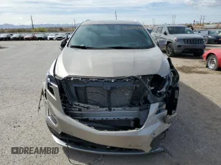 2022 Cadillac XT5 FWD Premium Luxury z VIN 1GYKNCRS9NZ180043, wystawiony jako Copart lot #51352195 z przebiegiem 12 399 mil mil oraz Szkoda całkowita • Salvage title. Historia ofert i sprzedaży dostępna na DreamBid. Obrazek 5.