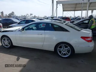2013 Mercedes-Benz E 350 with VIN WDDKJ5KB1DF197335, listed as a IAAI auction lot 42272831 with 58,092 mi miles and . Bid and sale history available at DreamBid. Image 14.