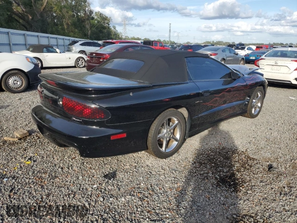 1999 Pontiac Firebird Trans Am with VIN 2G2FV32G1X2217352, listed as a Copart auction lot 79941714 with 174,580 mi miles and Salvage title. Bid and sale history available at DreamBid. Image 3.