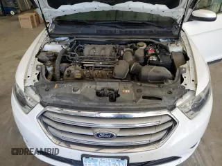 2017 Ford Taurus SEL z VIN 1FAHP2E87HG120587, wystawiony jako Copart lot #52598435 z przebiegiem 88 270 mil mil oraz Szkoda całkowita • Salvage title. Historia ofert i sprzedaży dostępna na DreamBid. Obrazek 11.