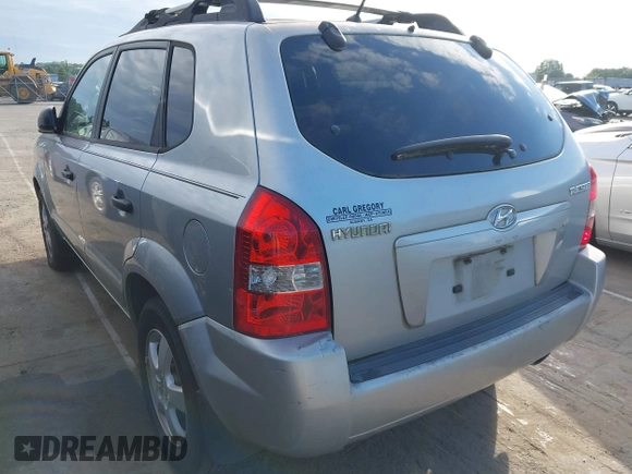 2006 Hyundai Tucson GL with VIN KM8JM12B26U469326, listed as a IAAI auction lot 42204742 with 240,998 mi miles. Bid and sale history available at carsss.com. Image 3.