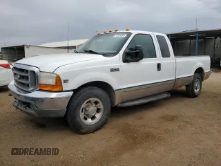 1999 Ford F-250 XL with VIN 1FTNX20F9XEA93857, listed as a Copart auction lot 51163655 with 228,657 mi miles and Salvage title. Bid and sale history available at DreamBid. Image 1.